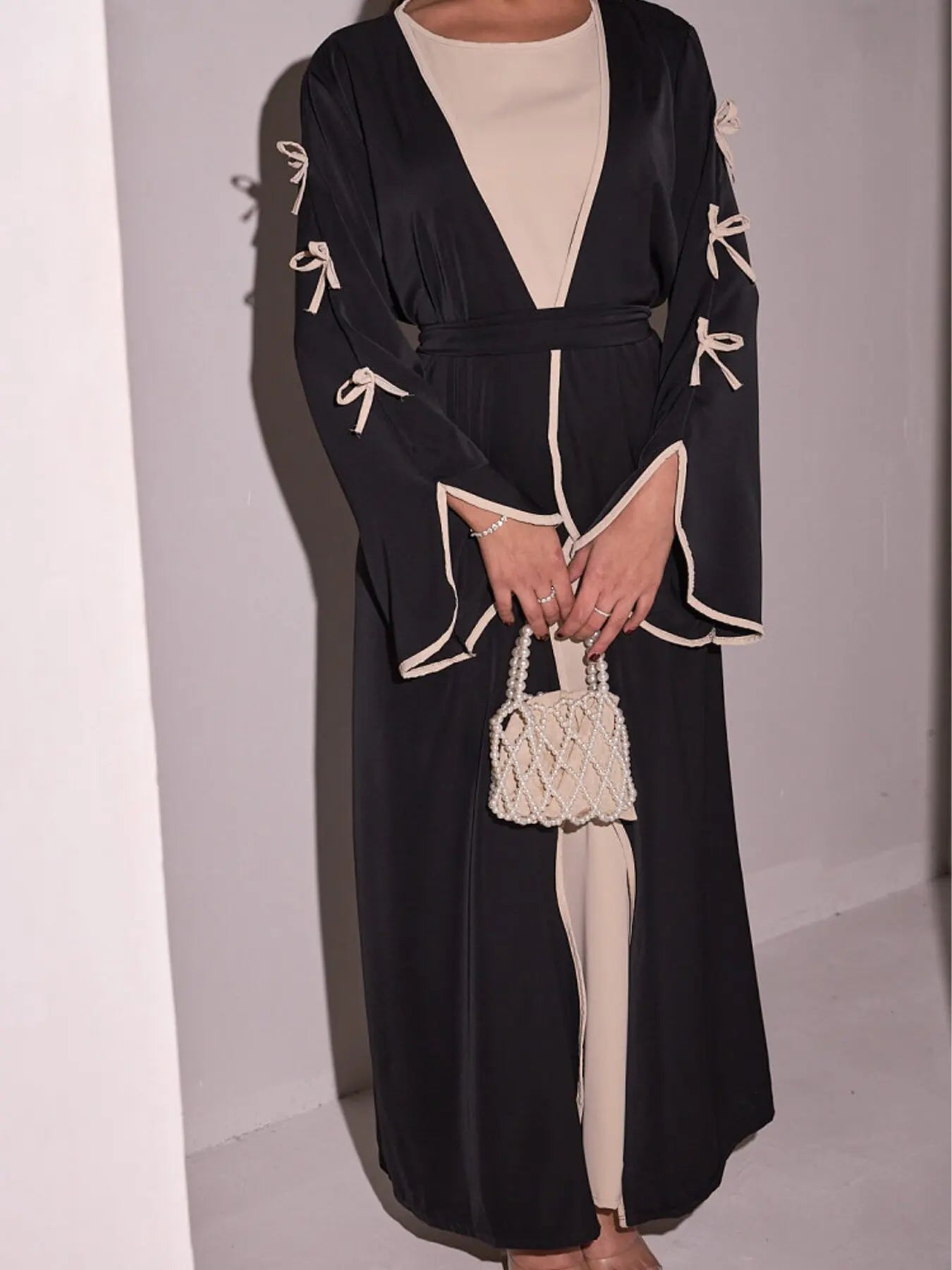 2025 New Dubai Stylish Islamic Black Abaya for Muslim Women Belted Design with Bow Detailing Modest Long Dress for Middle East