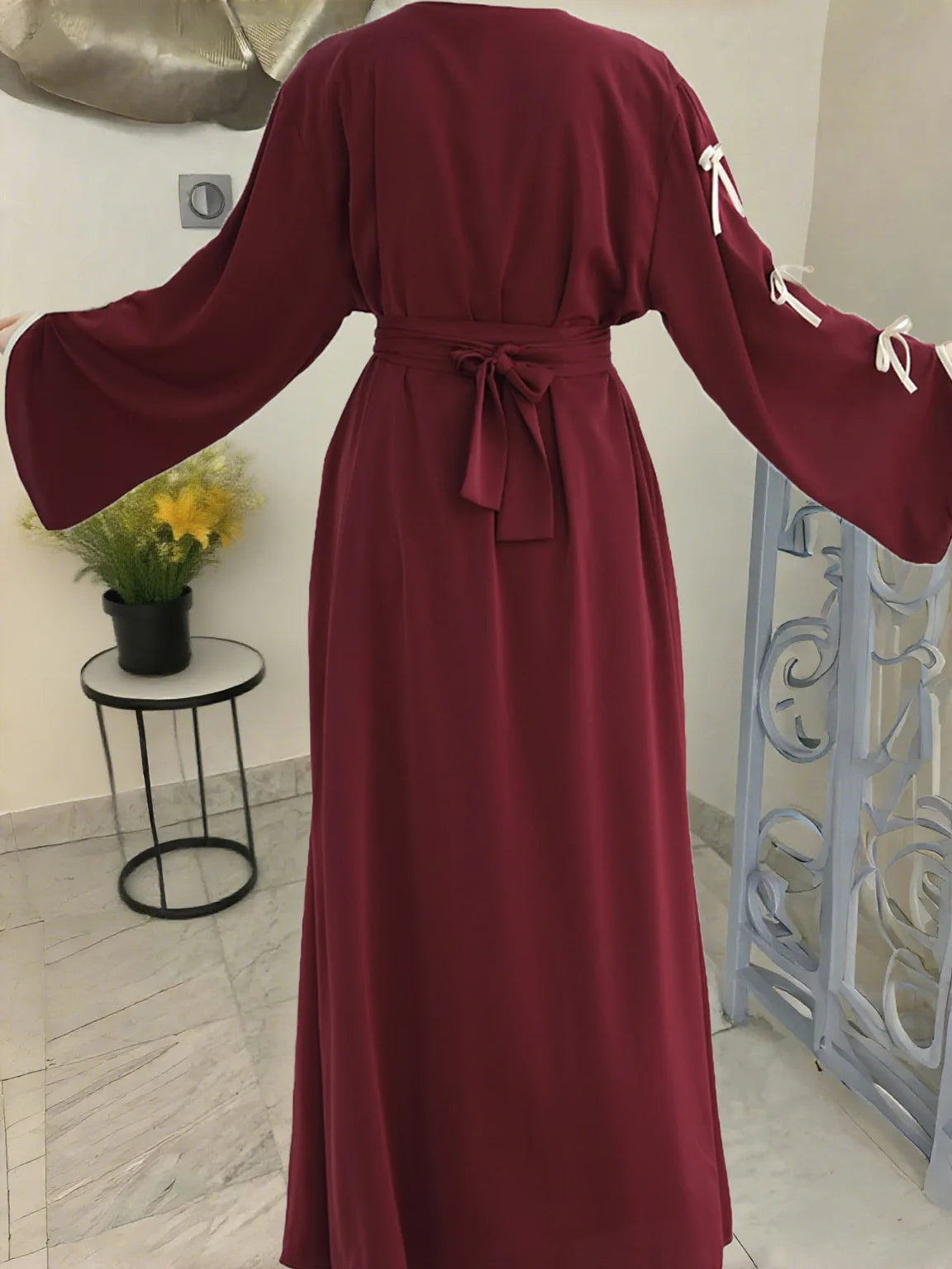 2025 New Dubai Stylish Islamic Black Abaya for Muslim Women Belted Design with Bow Detailing Modest Long Dress for Middle East