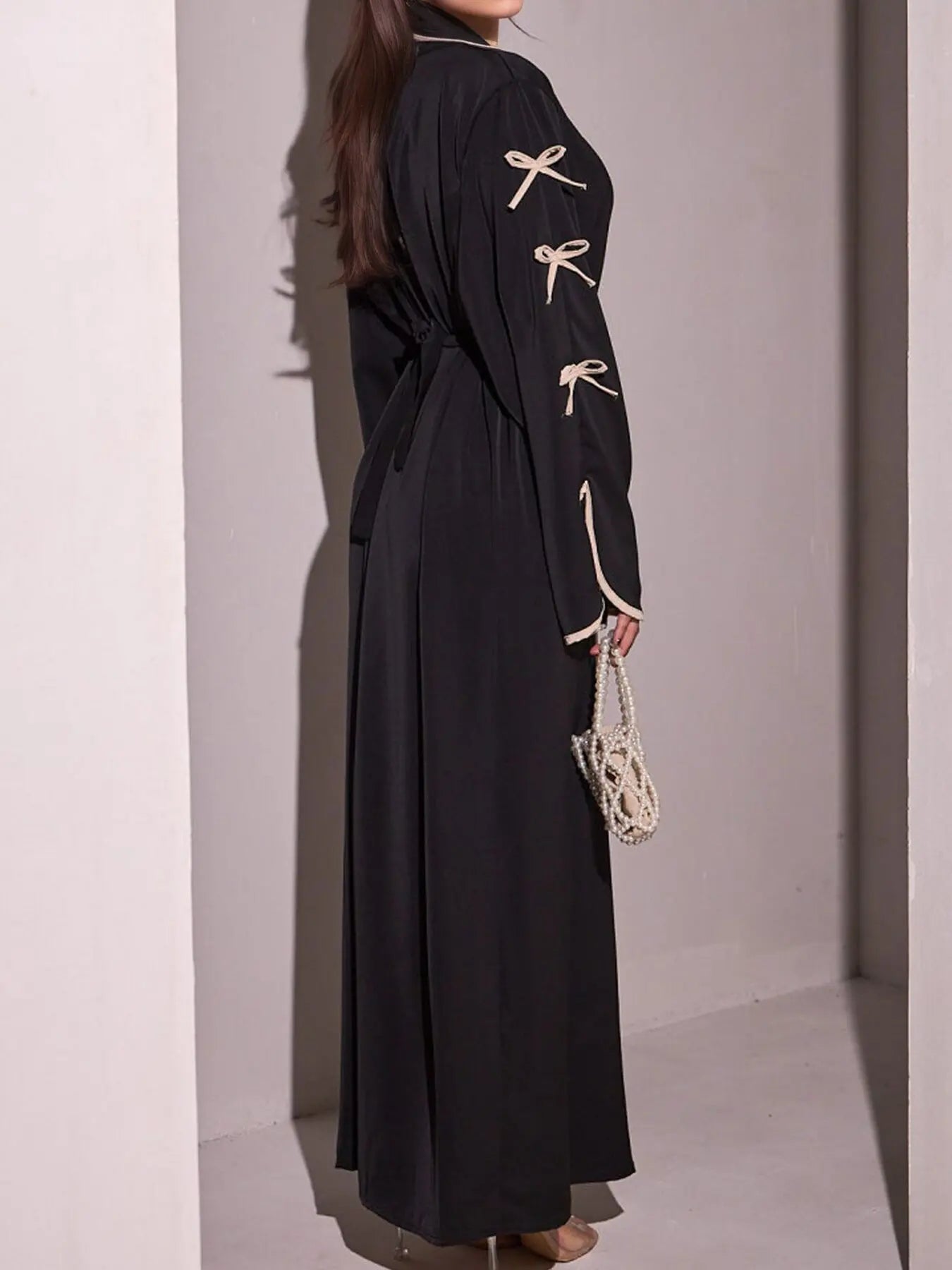 2025 New Dubai Stylish Islamic Black Abaya for Muslim Women Belted Design with Bow Detailing Modest Long Dress for Middle East