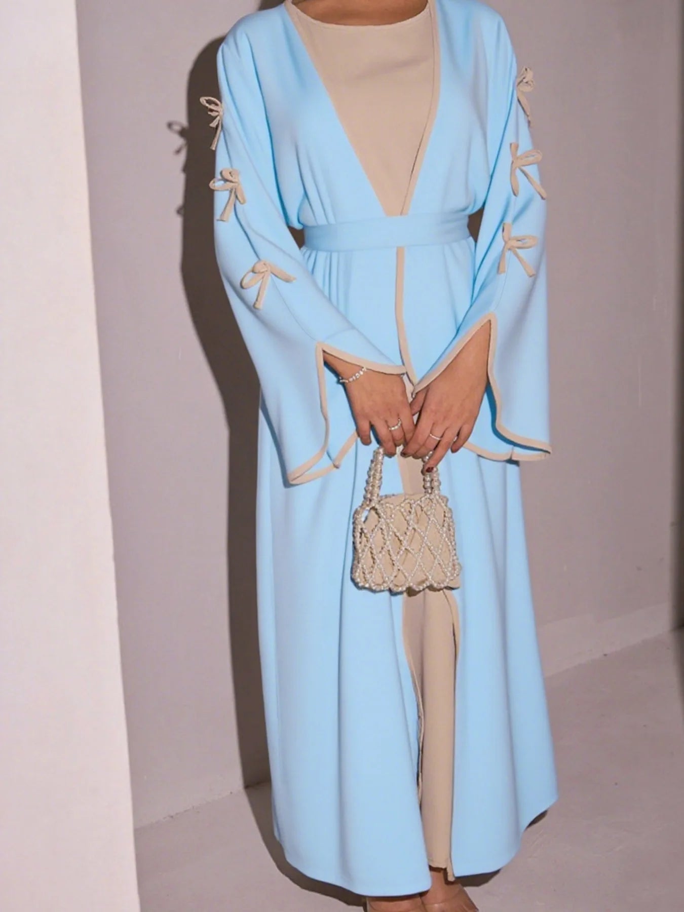 2025 New Dubai Stylish Islamic Black Abaya for Muslim Women Belted Design with Bow Detailing Modest Long Dress for Middle East