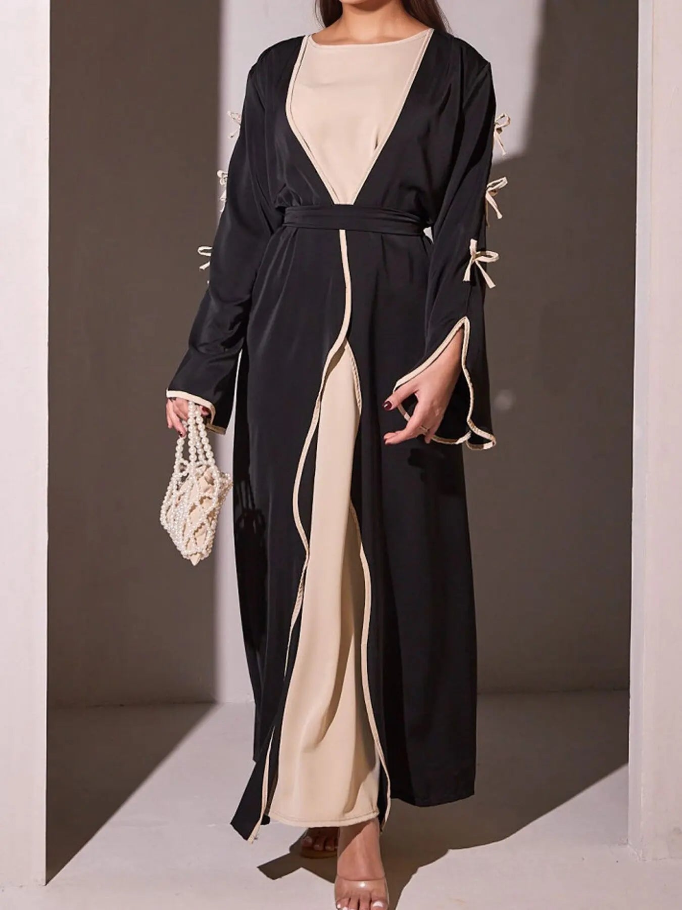 2025 New Dubai Stylish Islamic Black Abaya for Muslim Women Belted Design with Bow Detailing Modest Long Dress for Middle East